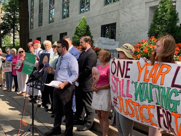 Hassan El-Tayyab delivers a speech in front of the Saudi Embassy.