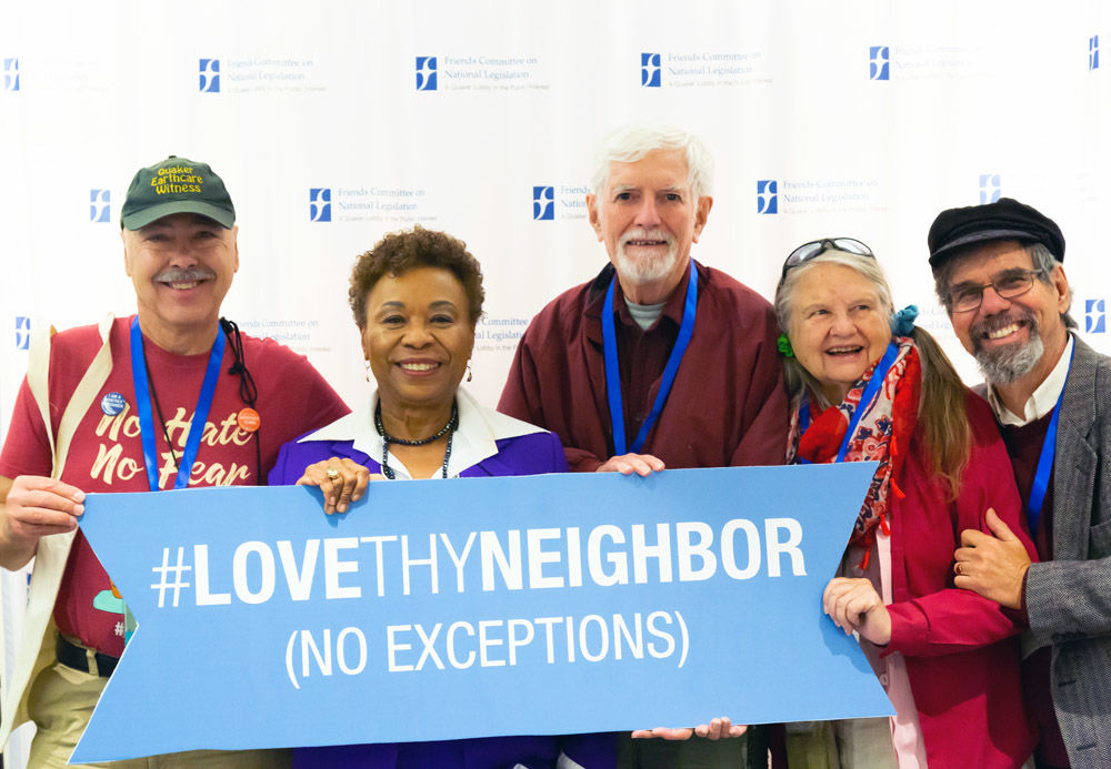 Rep. Barbara Lee (CA-13) and California Friends holding Love Thy Neighbor Sign at FCNL's Annual Meeting 2019.