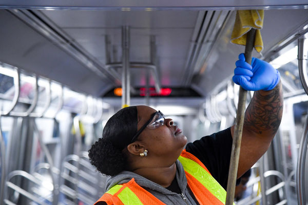 MTA New York City Transit personnel perform disinfectant sanitization aboard subway car March 3, 2020, as a precautionary measure in response to the novel coronavirus (COVID-19).