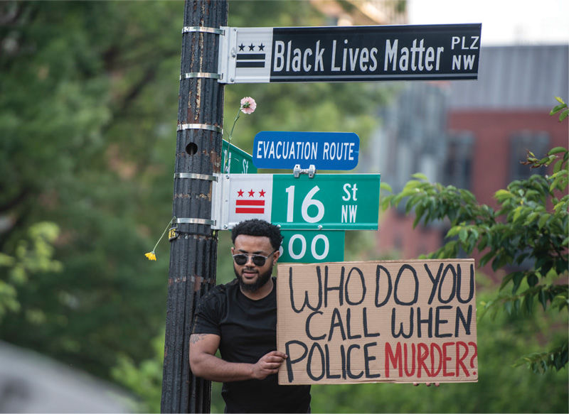 Who do you call? Protest picture.