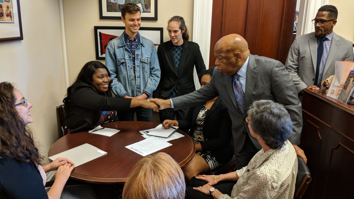Representative John Lewis shakes hands with FCNL constituents at Annual Meeting in November 2017